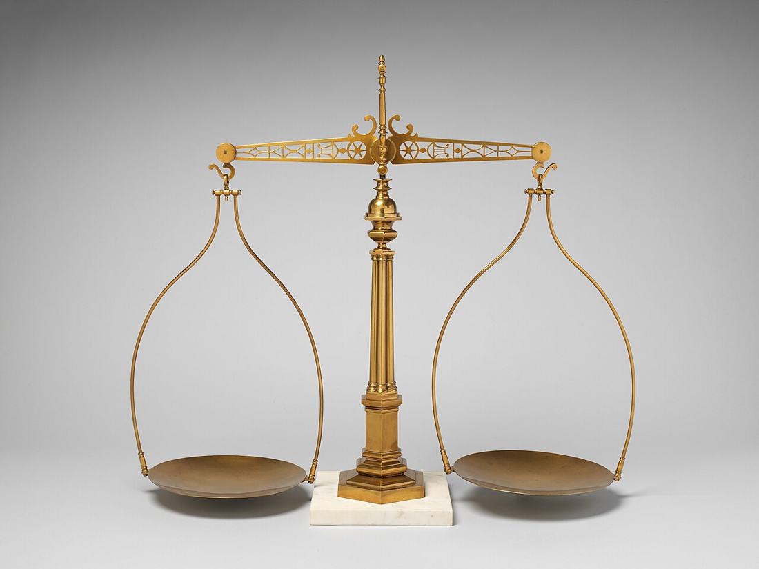 An antique balance scale in a museum.